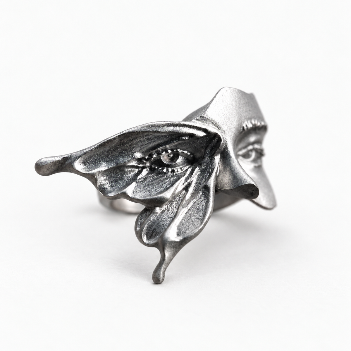 ANHOLANDO Face and Leaf Ring, left-oblique view on a near-white background