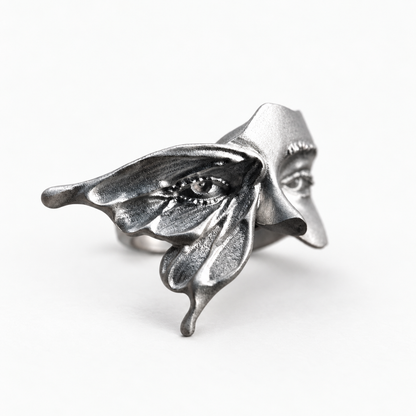 ANHOLANDO Face and Leaf Ring, left-oblique view on a near-white background